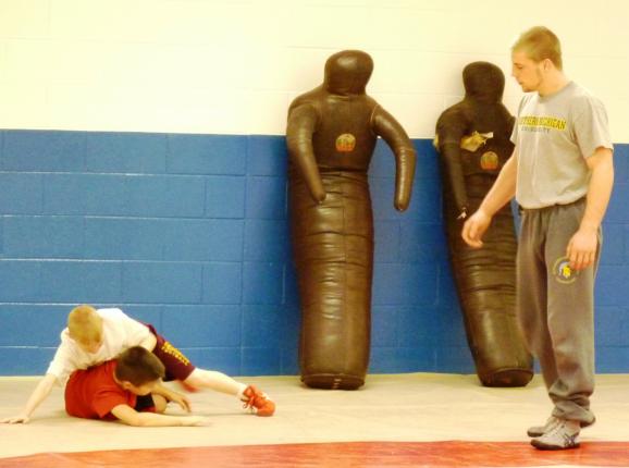 Stanghill coaches two club athletes during recent practice