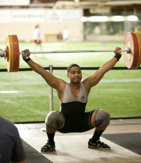Marc Spurlock lifts during recent event in the Superior Dome.