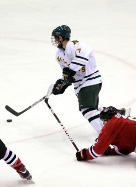 Tyler Gron brings the puck up ice.