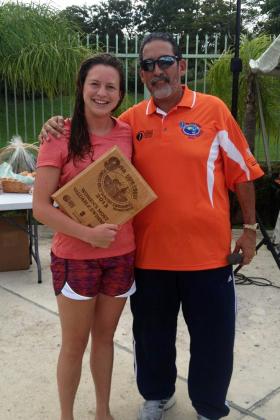 Emily Bourguignon receiving her plaque.