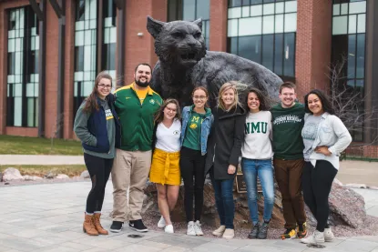 Students with the Wildcat statue