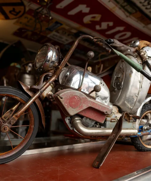 A motorcycle statue made of collected materials 