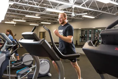 Student running on a treadmill