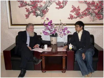 Dr. Hutchison meeting with Dr. Liang Yongia, Assistant Dean of the School of Sociology and Social Work at China University of Political Science and Law.