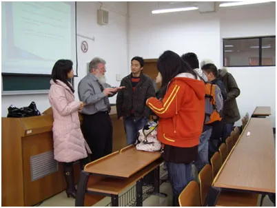 Meeting with social work students after class. Social Work Program Director, Miss Yang Xu, is standing to my right.