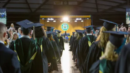 Students at NMU's commencement ceremony.