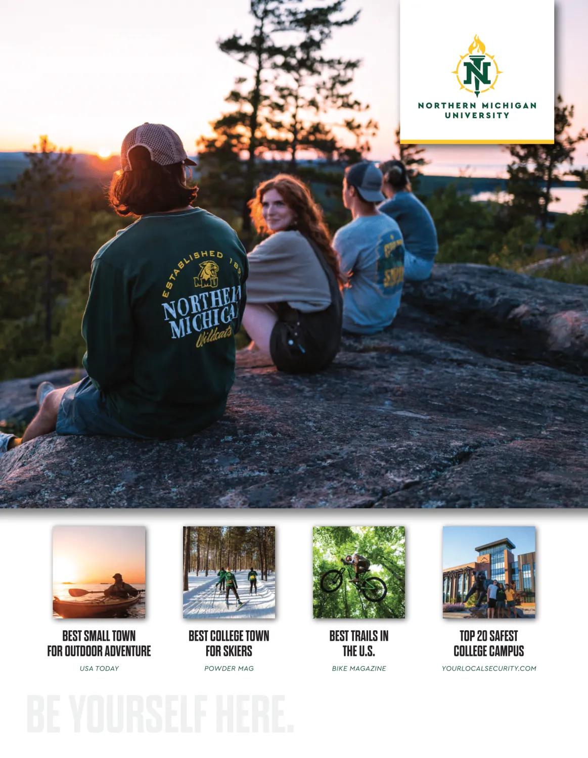 NMU Print Ad students on top of a mountain admiring the scenery below