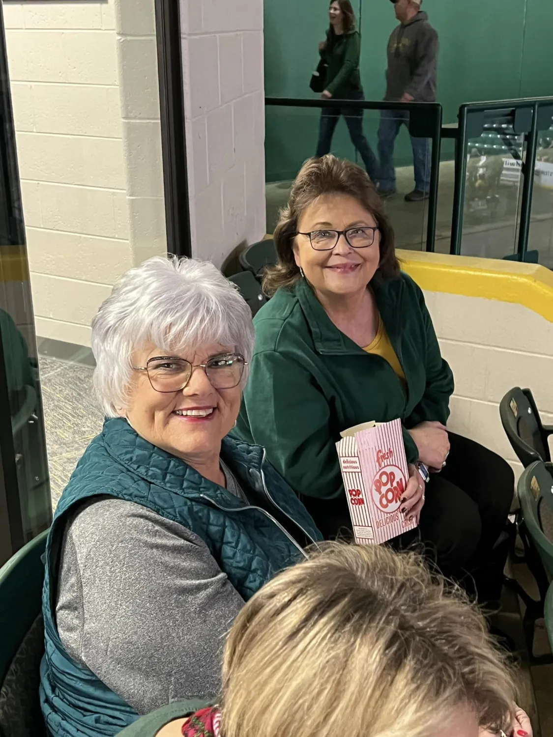 NMU Athletic Director Rick Comley hosted retirees at the Wildcats basketball games against Ferris State