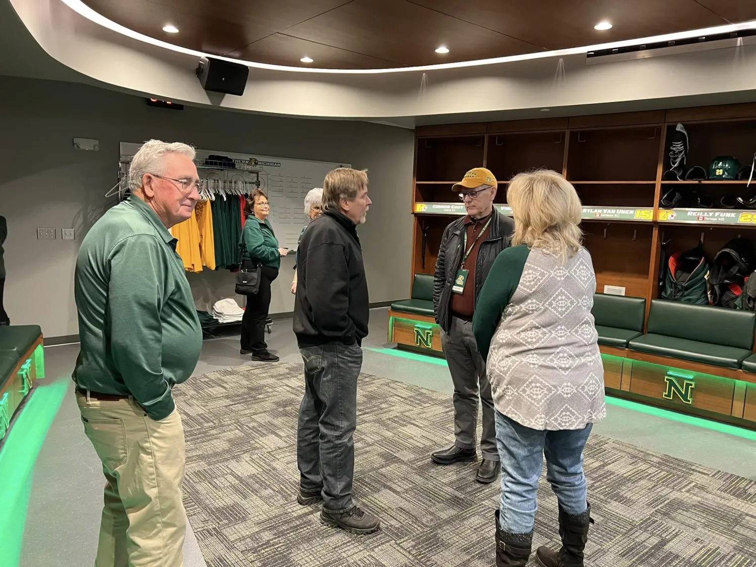 Retirees tour of the new Hockey locker room